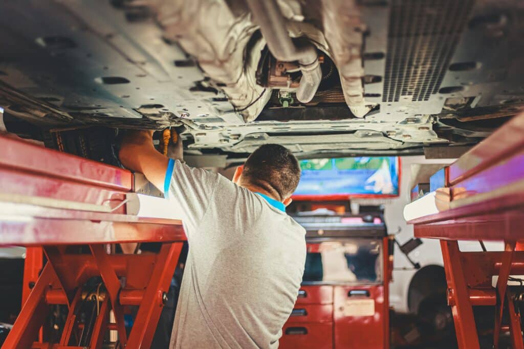 mechanic-working-on-car